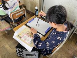 水で書く様子