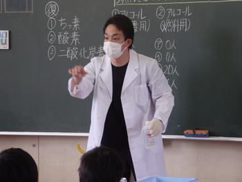 担当